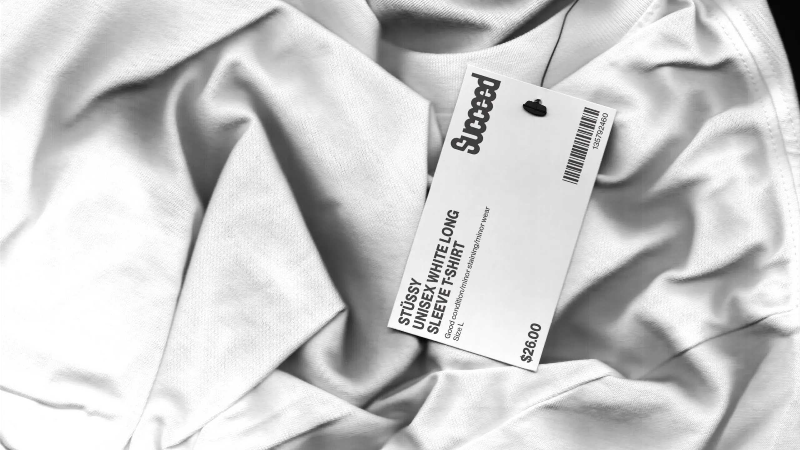 Tag on white shirt